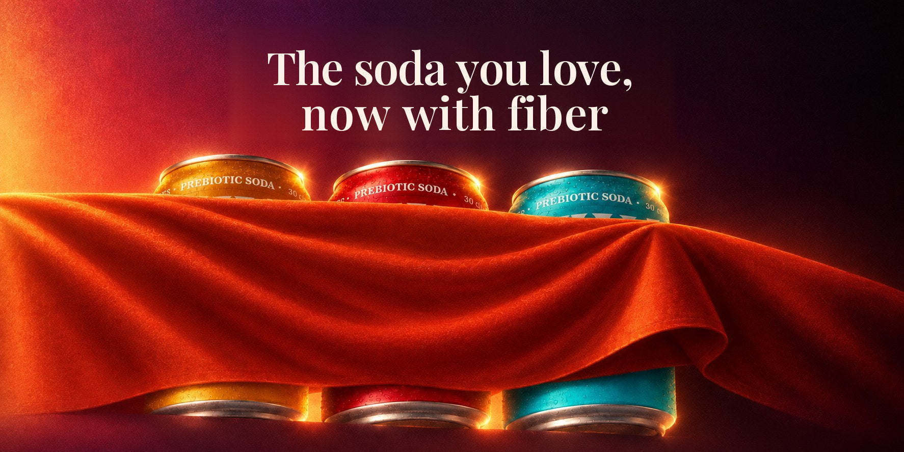The soda you love, now with fiber. — three cans of Milli under a red silk drape